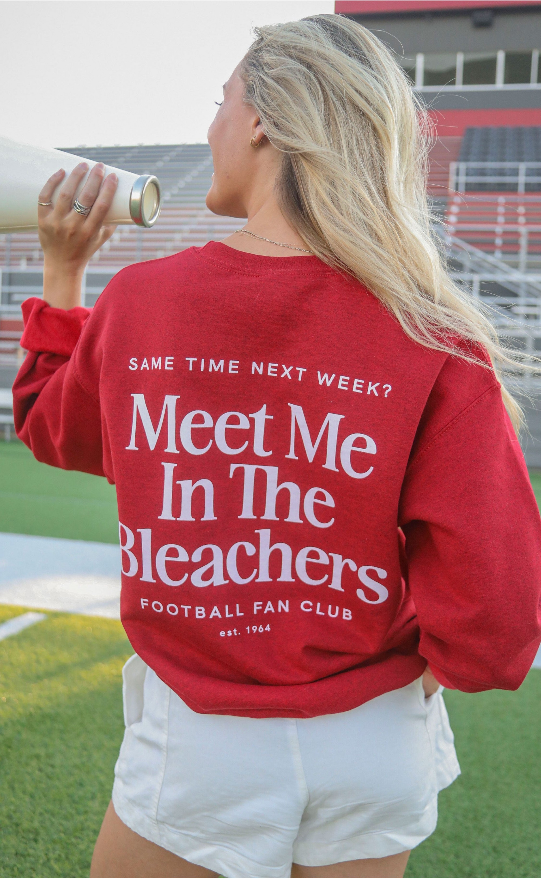 Wrap Yourself in Nostalgia and Comfort with the Meet Me in the Bleachers Sweatshirt